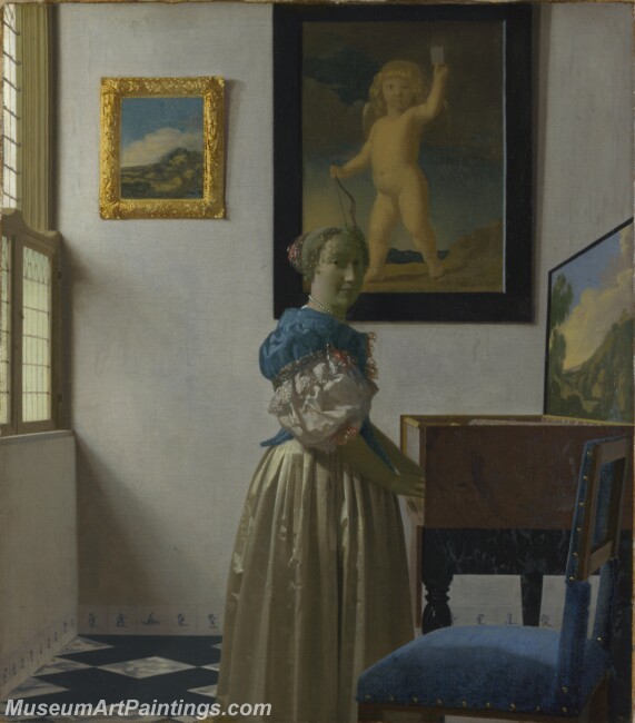 Johannes Vermeer A Young Woman standing at a Virginal Painting