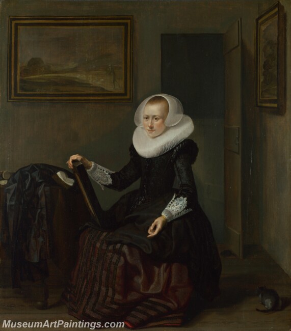 Pieter Codde A Woman holding a Mirror Painting